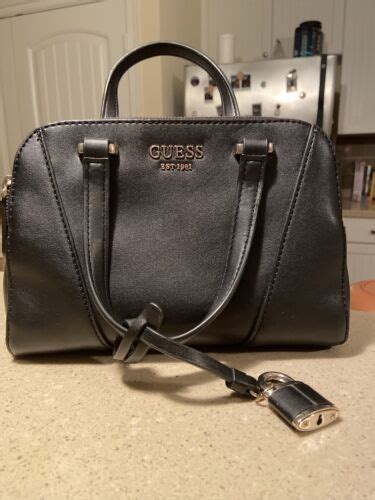 guess est 1981 purses